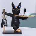 Black tuxedo Frenchie key rack with gold tray and key hooks — lifestyle