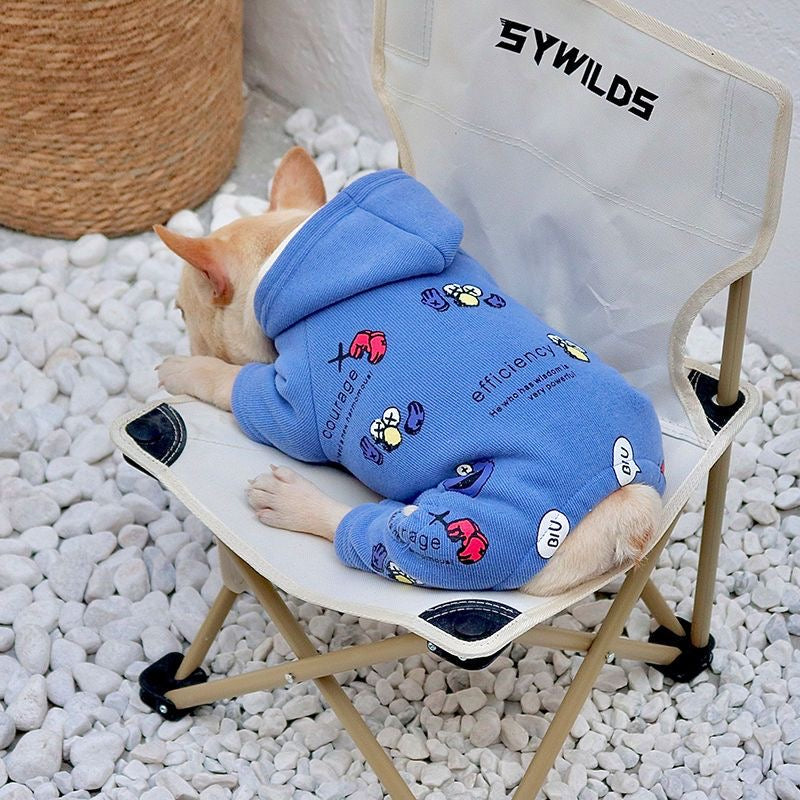 Blue graphic hooded romper — top-down view on camping chair