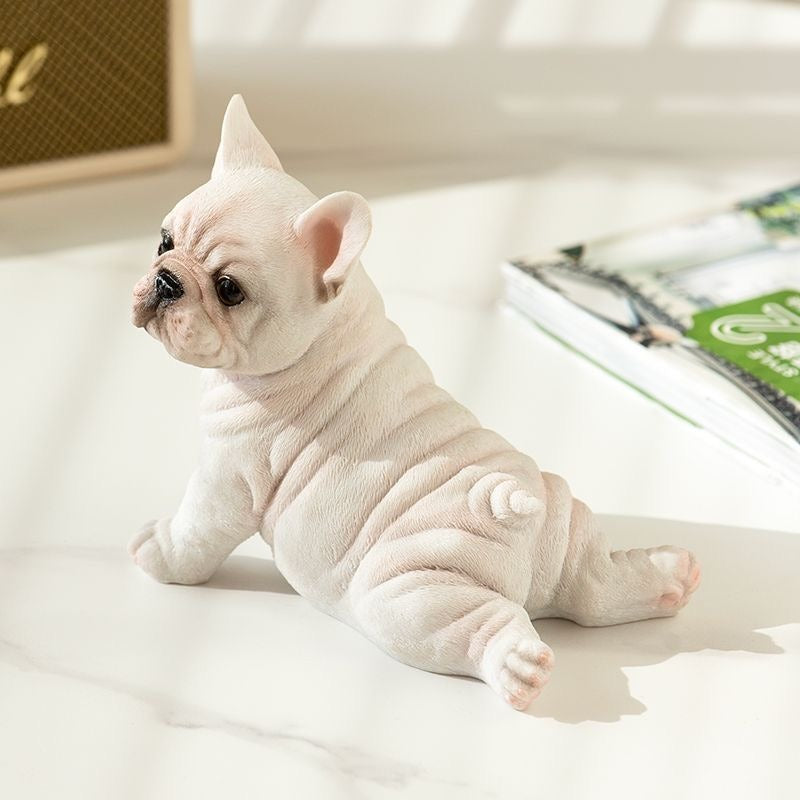 Cream prone Frenchie resin figurine, front view