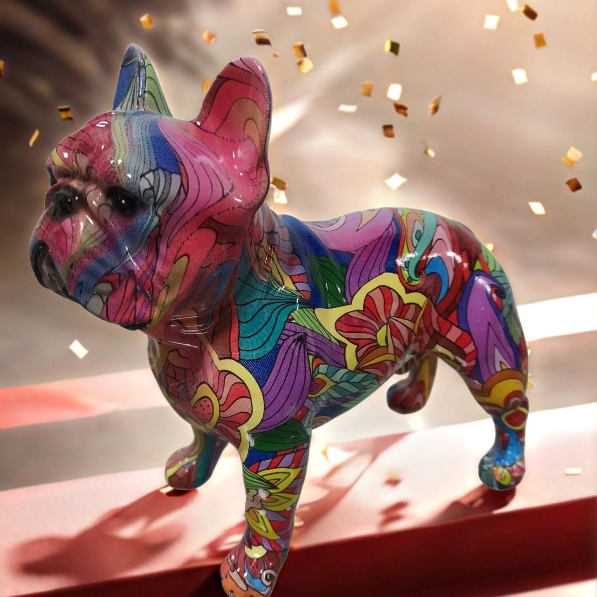 Country Frenchie resin statue — floral colorful décor on red pedestal