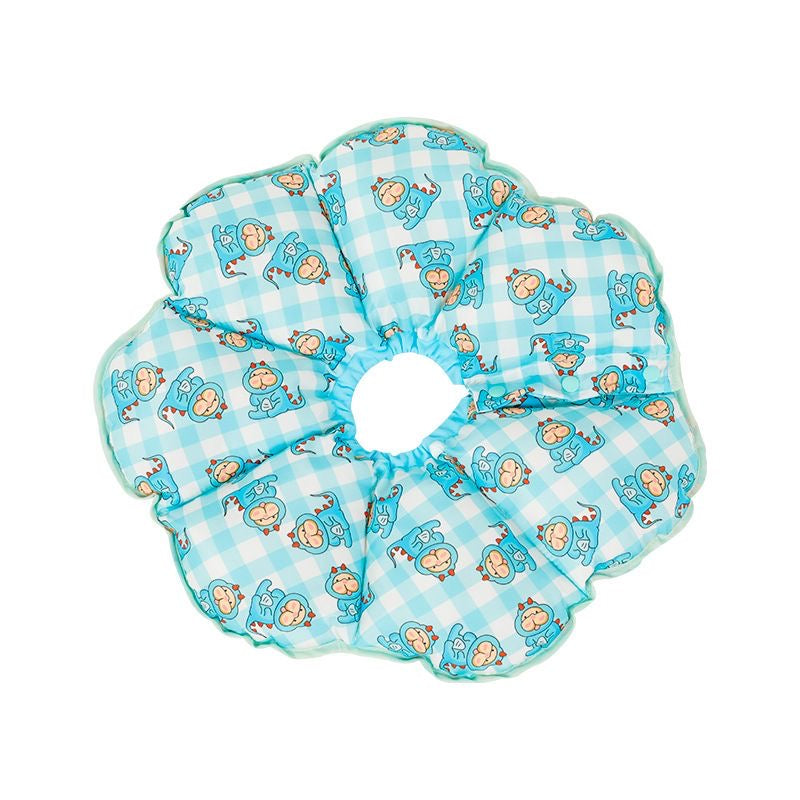 Dinosaur Blue soft flower recovery collar — flat lay with snaps