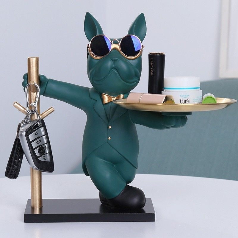 Green tuxedo Frenchie key rack with gold tray and key hooks — lifestyle