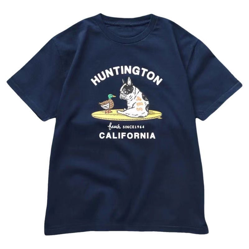 Navy Huntington Beach Frenchie Tee — French Bulldog and duck on yellow surfboard