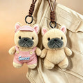 Fawn Frenchie plush bag charms on a bag, pink Sweet overalls