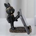 Black suit Frenchie resin phone stand holding a phone