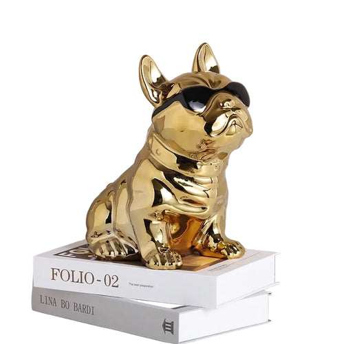 Gold chrome Dapper Frenchie tissue box holder dispensing a tissue