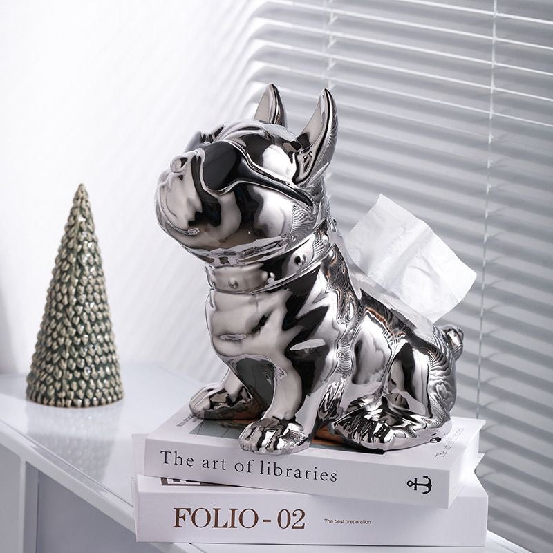 Silver Dapper Frenchie tissue box holder on a vanity with tissue dispensed