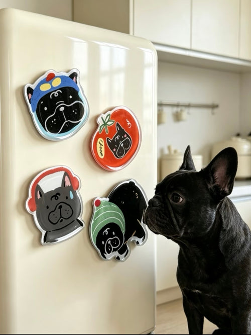 Cute French Bulldog acrylic fridge magnets on a fridge with a dog